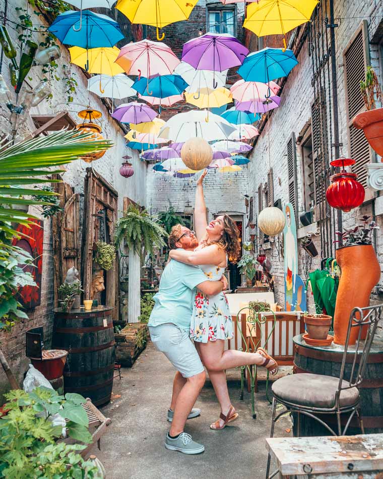 Lia and Jeremy Garcia in Red Tree Umbrella Alley Louisville Kentucky