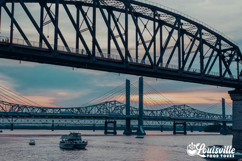 Bridges over the Ohio River in downtown Louisville Kentucky at sunset