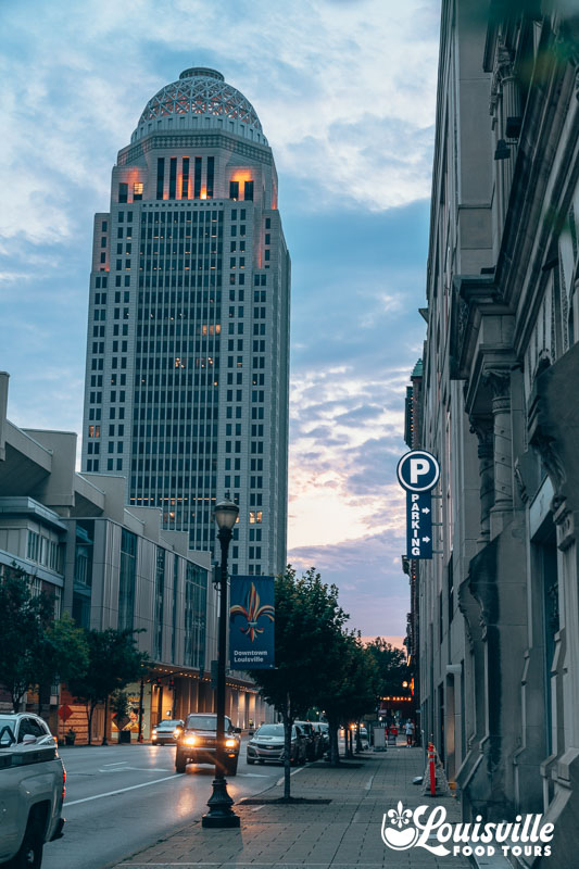 Providian Tower and downtown Louisville at twilight on a guided walking tour