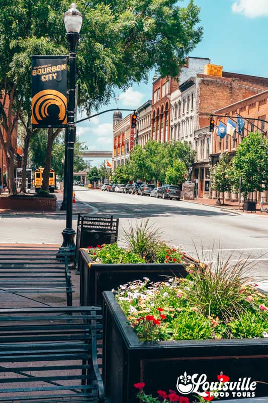 Shaded corner of downtown Louisville on a sunny day